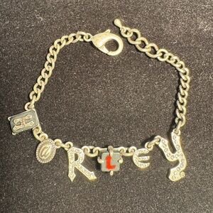 A silver-tone Harley Charm Bracelet - approximately 8" long